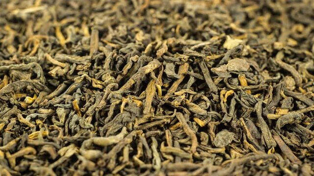 Green tea leaves close up rotation 4K
