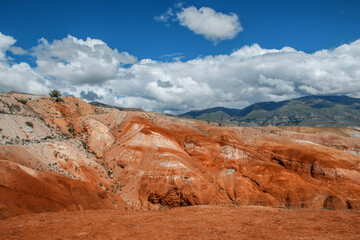Fototapeta na wymiar Red mountains in Kyzyl-Chin valley, also called as Mars valley. Altai, Siberia, Russia
