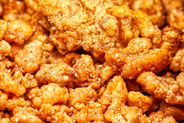 Homemade freshly crispy meaty greaves, detail