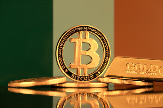 Physical version of Bitcoin, gold bar and Ireland Flag.