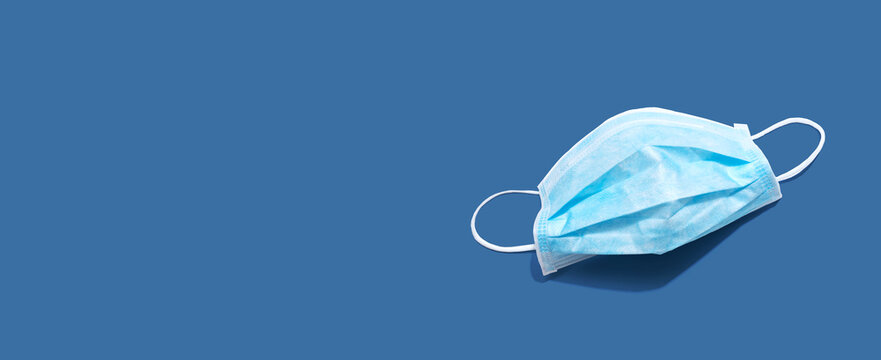 Blue surgical mask overhead view