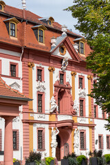 Obraz premium Red and white facade of the Kurmainzische Stadthalterei in Erfurt