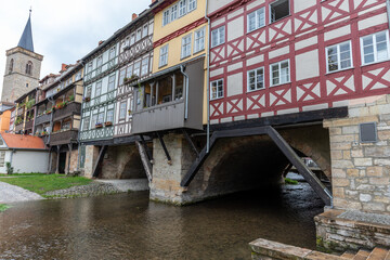 Fototapeta na wymiar Facades of historic half-timbered houses on Krämerbrücke in Erfurt