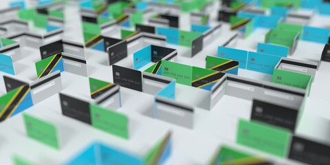 Fictional credit card maze with flag of Tanzania. Financial difficulties related 3D rendering