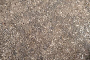 A very old concrete wall is a decorative or textured surface. Can be used as a background or for design purposes