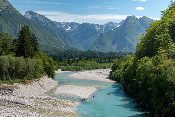 Happy kayakers on the Soča in Slovenia