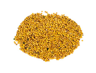 pile of yellow mustard seeds closeup on white