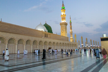 Muslim pilgrims at Masjid an-Nabawi. Prophet Mosque. Famous Green Dome.