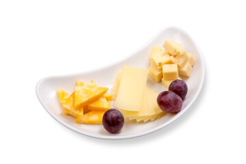 Cheese plate of three types of cheese with grapes. White background, white plate.