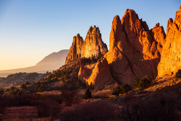 Sunrise shining on the mountains at Garden of the Gods in Colorado Springs, Colorado.