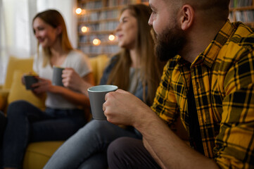 A group of friends hanging out together at a house party