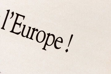 Fototapeta na wymiar text written in black and white - featuring serif font with the word Europe or in French l'Europe