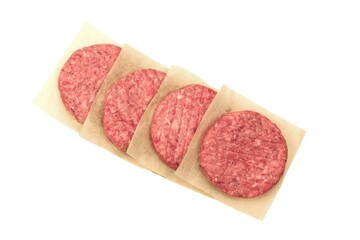 Raw Minced Steak Burgers from Beef and Pork Meat Isolated on White Background, Overhead View. Uncooked Round Patties for Grilling from Ground Beef And Pork. Homemade Burgers For BBQ Grill, Top View.