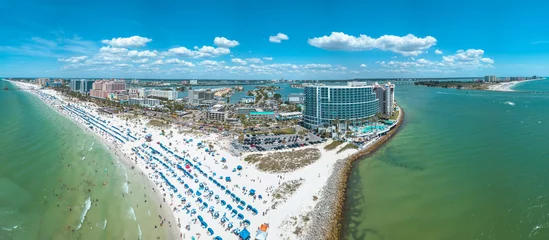 Cercles muraux Clearwater Beach, Floride Summer vacations in Florida. Panorama of Ocean beach and Resorts in US. Blue-turquoise color of water. American Coast or shore. Island in Gulf of Mexico. Clearwater Beach FL. Aerial view on city