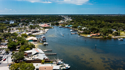 Fototapeta na wymiar Located along the Gulf of Mexico about 35 miles northwest of Tampa, Port Richey's riverfront landscape blends nature, beaches and terrific shopping with restaurants, culture and business – all wit