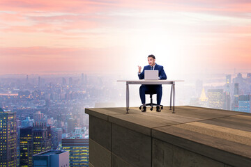 Fototapeta premium Businessman self isolating on the top