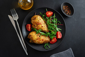 Grilled chicken breast with vegetables and salad