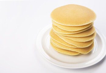 American pancakes on a white background.