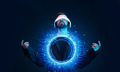 Man on dark virtual reality background. Guy using VR helmet. Augmented reality, future technology, game concept. Blue neon light. Futuristic holographic interface to display data.