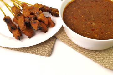 Malaysian chicken satay with delicious peanut sauce, one of the famous local dishes during Eid Mubarak