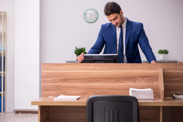 Young businessman employee working in the office