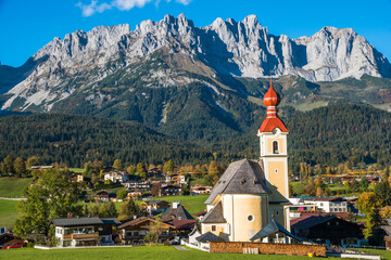 Beautiful view of Heiliges Kreuz Church and Going am Wilden Kaiser village - Tyrol, Austria - obrazy, fototapety, plakaty