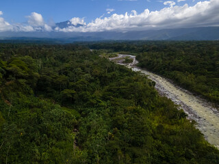 Fototapeta na wymiar Beautiful aerial view of the Guapiles town and river in Limon Costa Rica