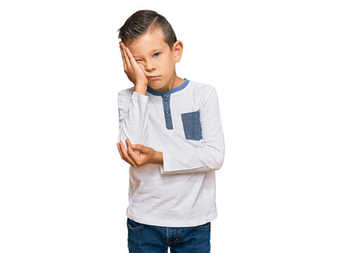 Adorable caucasian kid wearing casual clothes thinking looking tired and bored with depression problems with crossed arms.