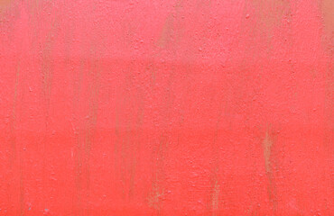 Vertical smears of red paint on a brown surface. Color - Burnt Sienna Hue Brown. cracks, scratches.