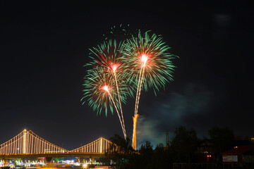 SURATTHANI, THAILAND - OCTOBER 17 : Beautiful firework display for celebration on the Tapee river on parades in Chak Phra Festival on October 17, 2015 in Suratthani, Thailand.