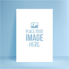 Isolated vertical poster mockup, white blank sheet template on minimal blue scene