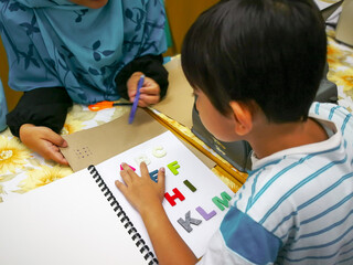Learning to braille.