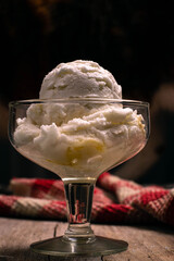 cream ice cream with dulce de leche caramel and wafer