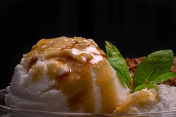 cream ice cream with dulce de leche caramel and wafer