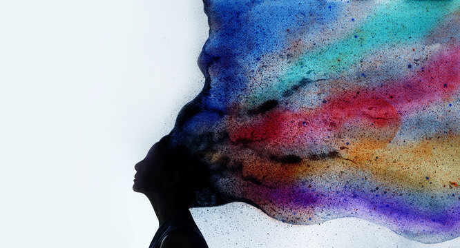 Mental Health, Imagination and Creativity Concept. Silhouette photo of Woman combined with Colorful Watercolor. Positive Mind, Freedom, Enjoying and Life Philosophy