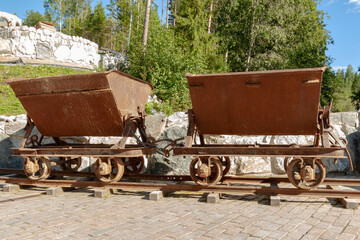 Old small railroad freight cars used for coal mining