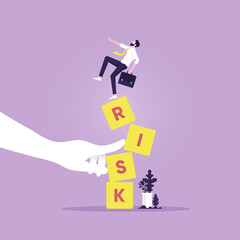 Businessman standing on shaky risk blocks by hand of enemy,Stability or balance of economics and investment, Investment risk concept