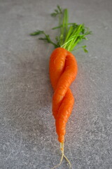 Ugly organic carrot on kitchen desk