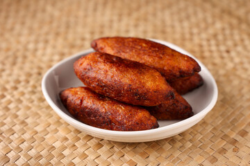 Unnakkaya , banana rolls,  popular Kerala snack for Ramadan Kareem, India, sri Lanka . Traditional Iftar food dish Malabar Muslim feast. Holy month of Ramadan. tea time snack