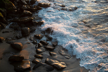 Sea waves and rock on the beach. Beautiful seascape nature. Travel and vacation, copy space.