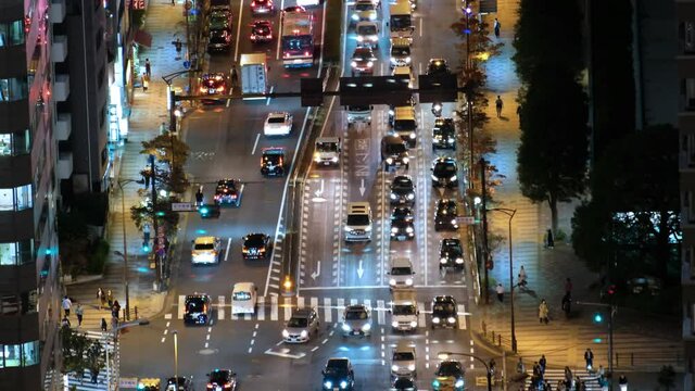 Video of illuminated Sakurada-dori avenue at night. The view from the Tokyo Tower observation deck. Tokyo, Japan