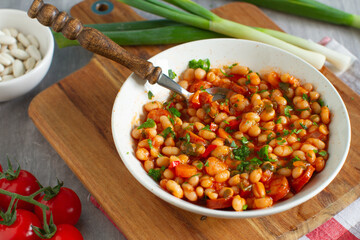 Homemade white bean stew, rustic style on a table