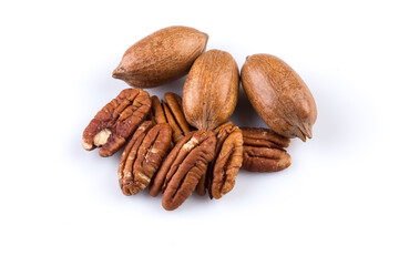 Few pecan nuts isolated on white