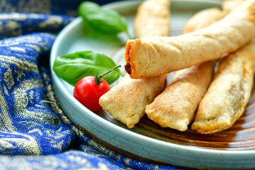 Deep Fried Turkish Cigar Shaped Rolls - Spring roll Sigara Borek.  Fried dough borek   with minced meat