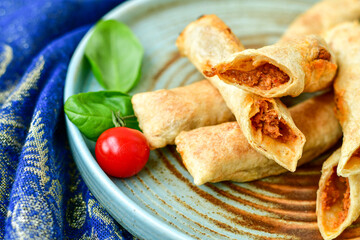 Deep Fried Turkish Cigar Shaped Rolls - Spring roll Sigara Borek.  Fried dough borek   with minced meat