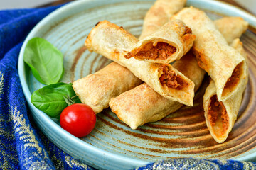 Deep Fried Turkish Cigar Shaped Rolls - Spring roll Sigara Borek.  Fried dough borek   with minced meat