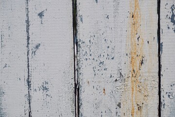 Old wooden fence with peeling paint
