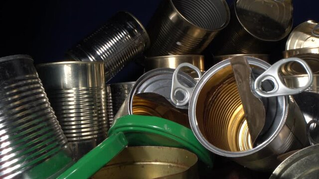 Metal waste sorting and recycle. Household recycle box for metal cans (aluminum, tin and steel food packaging). Recycling of domestic waste. Metallic garbage, trash, pollution, sustainable living