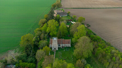 Naklejka premium An aerial view of the Church of St Mary in the village of Playford, Suffolk, UK