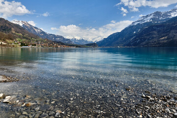 Fototapeta premium Scenic View Of Lake And Snowcapped Montains Against Sky